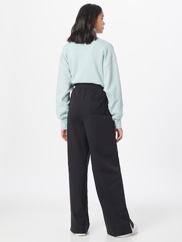 Reebok Wide leg Broek in Zwart