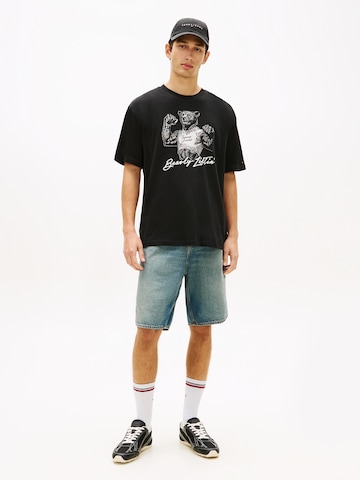 Tommy Jeans T-shirt 'BEAR' i svart