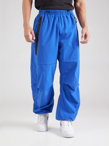 Nike Sportswear Tapered Nadrág 'Tech' - kék: elől