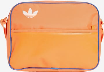 ADIDAS ORIGINALS - Bolso de hombro 'Airliner' en naranja: frente