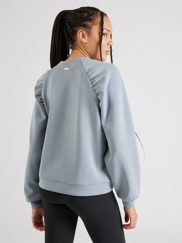 Athlecia Sports sweatshirt in Blue