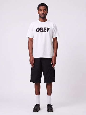 Carhartt WIP Baggy Bukser 'REGULAR CARGO SHORT BLACK' i sort: forside