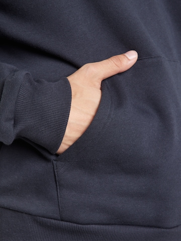 Felpa sportiva di UNDER ARMOUR in nero