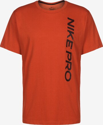 NIKE Regular fit Performance Shirt 'Pro' in Orange: front