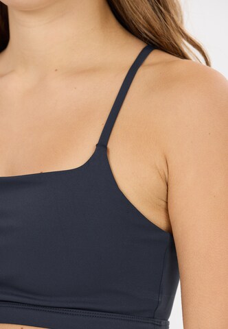 Athlecia Low Support Sport-BH 'Blossom' in Blau