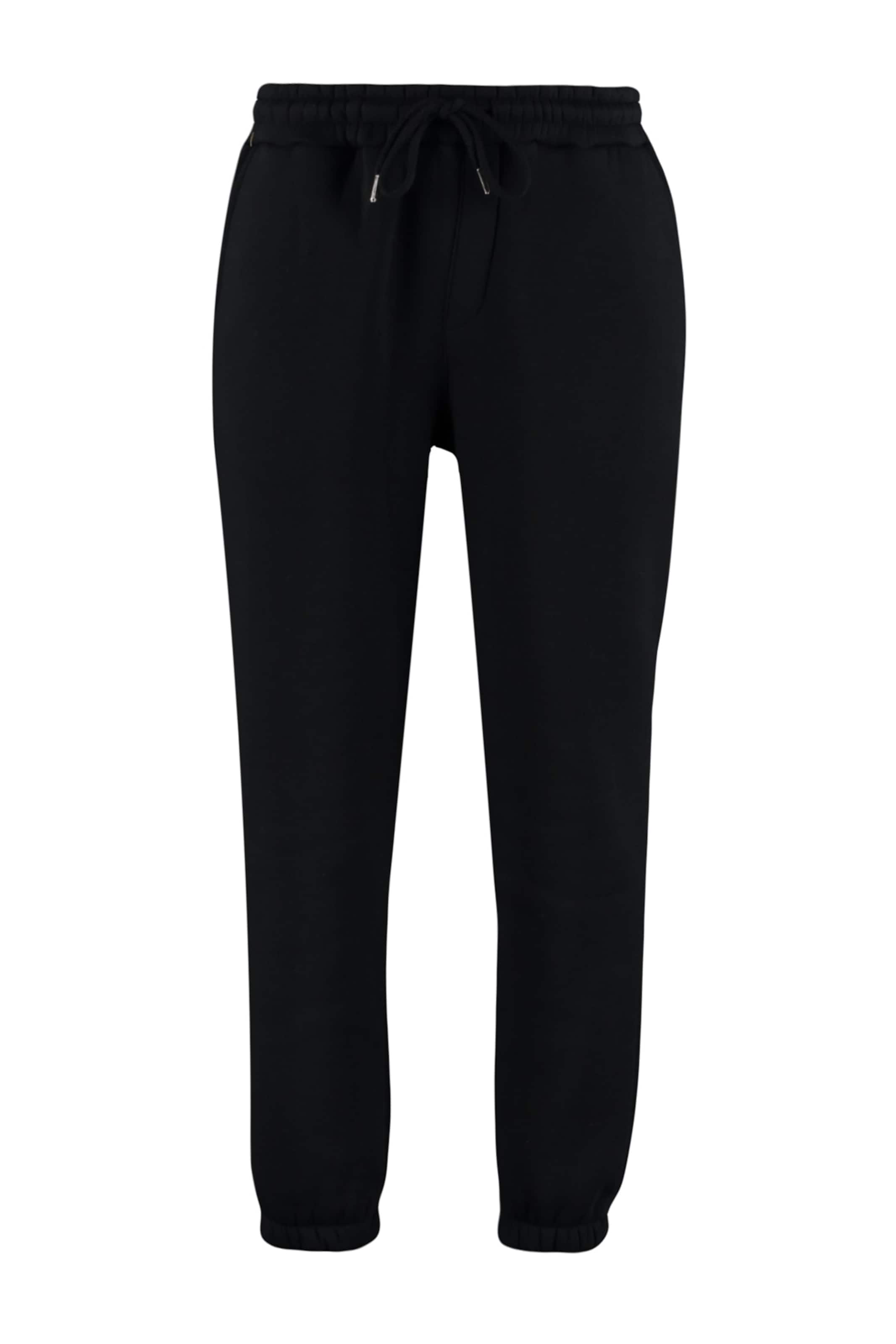 Trendyol - Tapered Pantalón en negro: frente