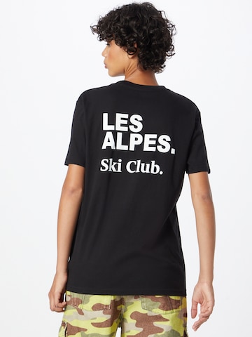 Les Petits Basics Tričko 'Les Alpes' - Čierna