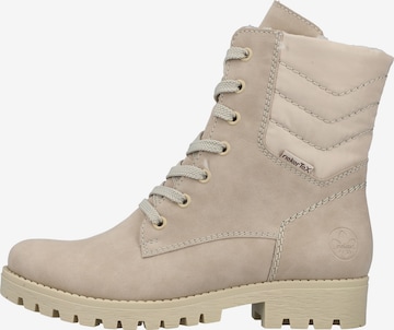 Bottines à lacets Rieker en beige