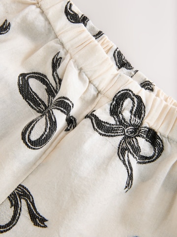 juoda Next Miego kostiumas