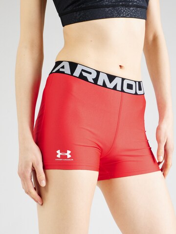 UNDER ARMOUR Skinny Spodnie sportowe 'Authentics' w kolorze czerwony
