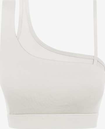 Born Living Yoga Sporttop ' Karma ' in Beige: voorkant