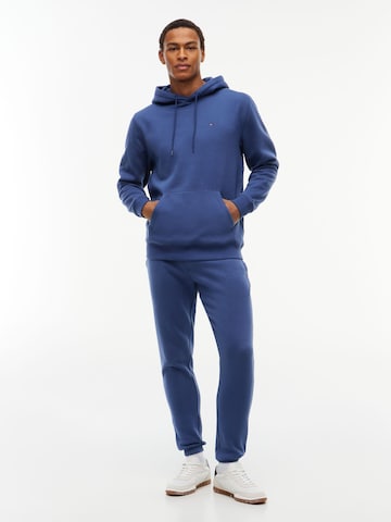 Tommy Jeans Tapered Hose in Blau