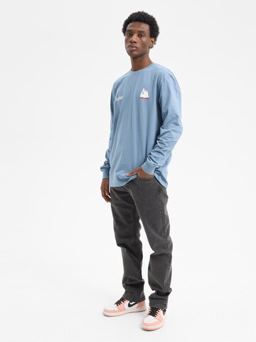 hydroponic - Camiseta 'Hydroponic x Peanuts Regular-Fit Long-Sleeve Ski Lift T-Shirt' en azul
