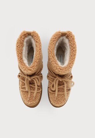 INUIKII - Botas de nieve 'CURLY' en beige