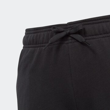 Tapered Pantaloni sportivi 'Essentials Linear Logo' di ADIDAS SPORTSWEAR in nero