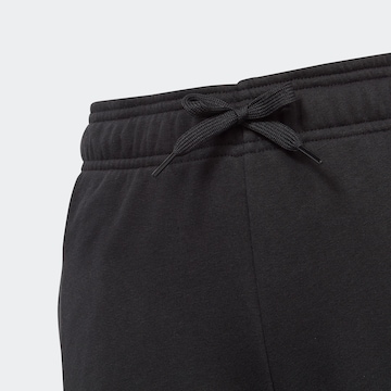 Effilé Pantalon de sport 'Essentials Linear Logo' ADIDAS SPORTSWEAR en noir
