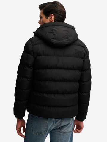 Superdry Winterjas 'Hooded Sports Puffer Jacket SDM5011905A' in Zwart