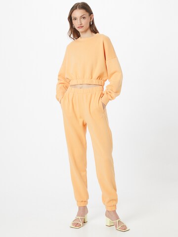 HOLLISTER Sweat suit in Orange: front