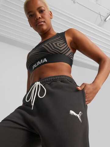 PUMA Tapered Sportbroek in Zwart