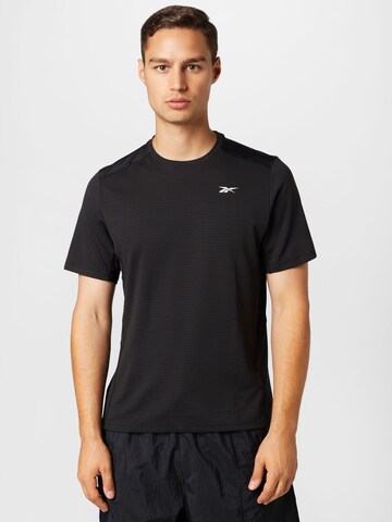 Reebok - Camiseta funcional en negro: frente