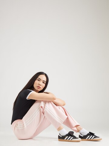 ADIDAS ORIGINALS Normalny krój Spodnie 'KNITTED TD TP' w kolorze różowy