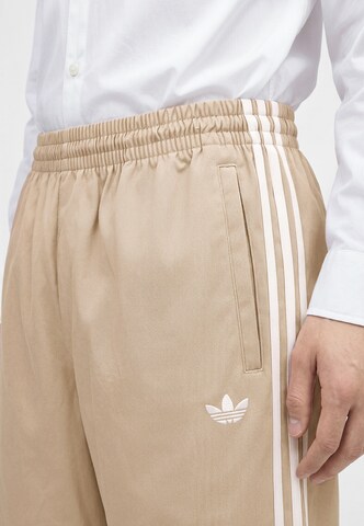 zaļš ADIDAS ORIGINALS Vaļīgs piegriezums Bikses