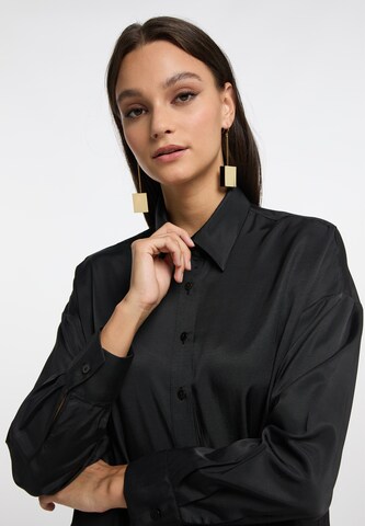 RISA - Blusa en negro