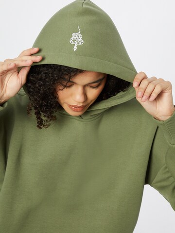 ABOUT YOU x INNA Sweatshirt 'Alessia' in Green