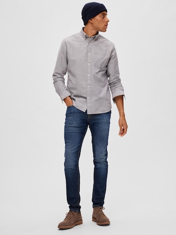 Coupe slim Jean 'Leon' SELECTED HOMME en bleu