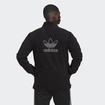 ADIDAS ORIGINALSFlis jakna 'Adicolor Classics Trefoil' - crna boja: prednji dio