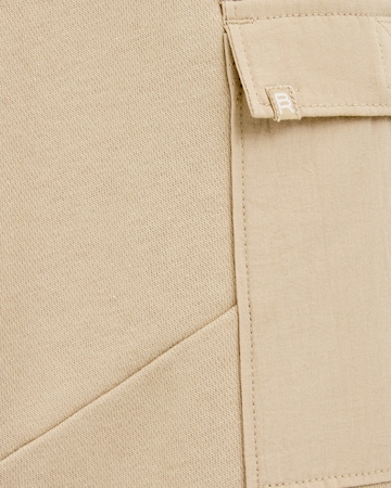 WE Fashion Дънки Tapered Leg Панталон в бежово