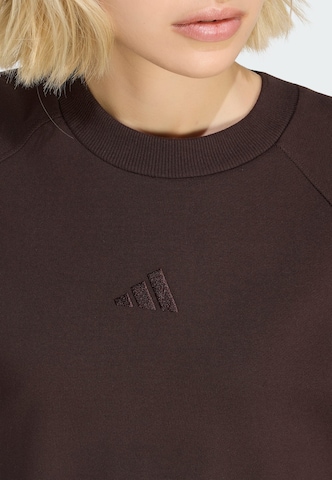 ADIDAS SPORTSWEAR - Camiseta deportiva en marrón