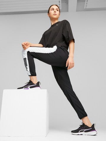 PUMA Tapered Sportbroek in Zwart