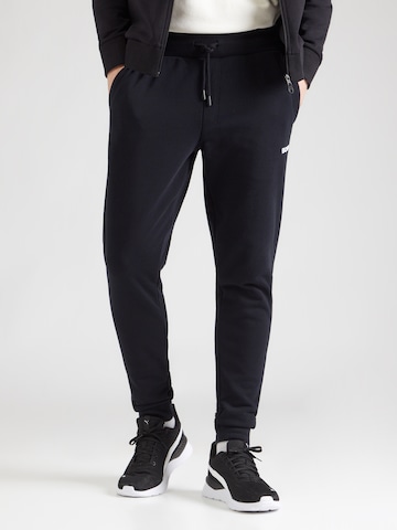 Tapered Pantaloni sportivi 'ESSENTIAL 4' di BJÖRN BORG in nero: frontale