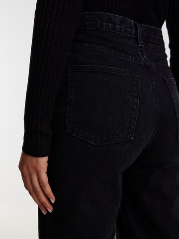 EDITED Wide leg Jeans 'Avery' i svart
