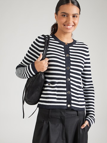 monari Kofta i vit: framsida