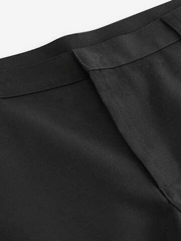 Next Slimfit Kalhoty – černá