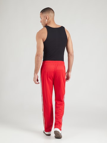 Regular Pantaloni 'FIREBIRD' de la ADIDAS ORIGINALS pe roșu
