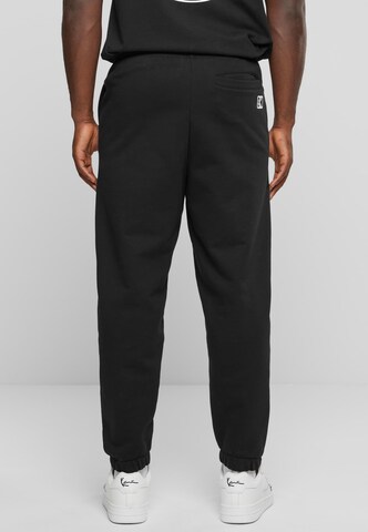 Effilé Pantalon Karl Kani en noir