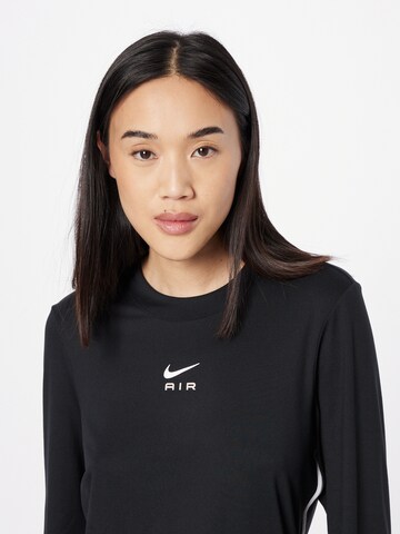 NIKE - Camiseta funcional 'Air' en negro