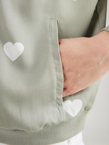 Veste mi-saison 'Erika' ABOUT YOU en vert