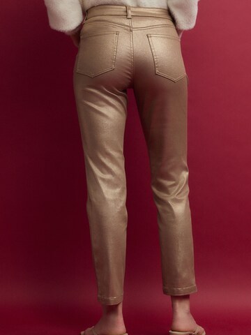Next Loosefit Jeans i guld
