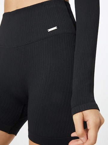 Skinny Pantaloni sportivi di aim'n in nero