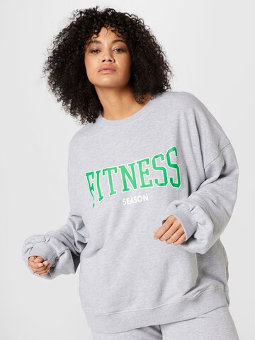 Public Desire Curve Sweatshirt in Grijs: voorkant