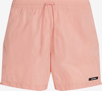 Calvin Klein Swimwear Board Shorts in Orange: front
