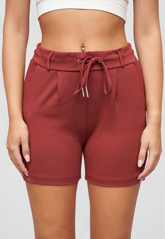 Slimfit Pantaloni di Cloud5ive in rosa: frontale