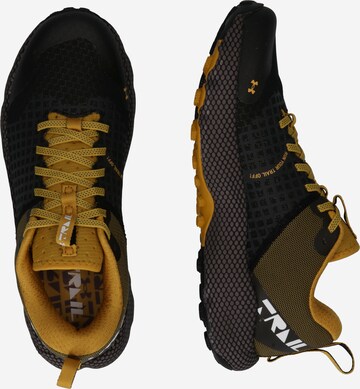 UNDER ARMOUR Running Shoes in Black