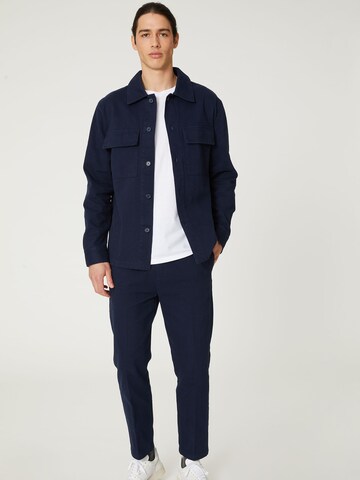 DAN FOX APPAREL Tapered Trousers with creases 'Elian' in Blue