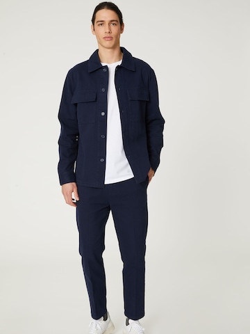 DAN FOX APPAREL Tapered Pleated Pants 'Elian' in Blue