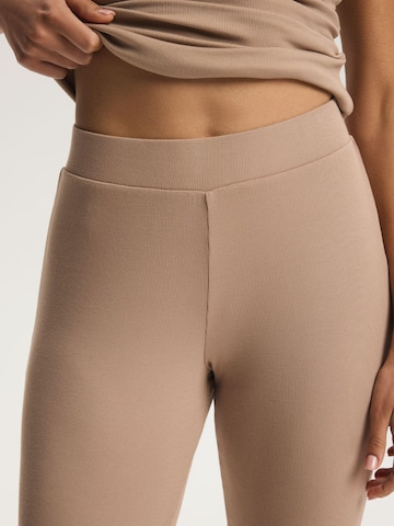 ESOTIQ - Acampanado Pantalón 'Haushose Schlaghose Viskose Mix weich bequem elastischer Bund Clear' en beige
